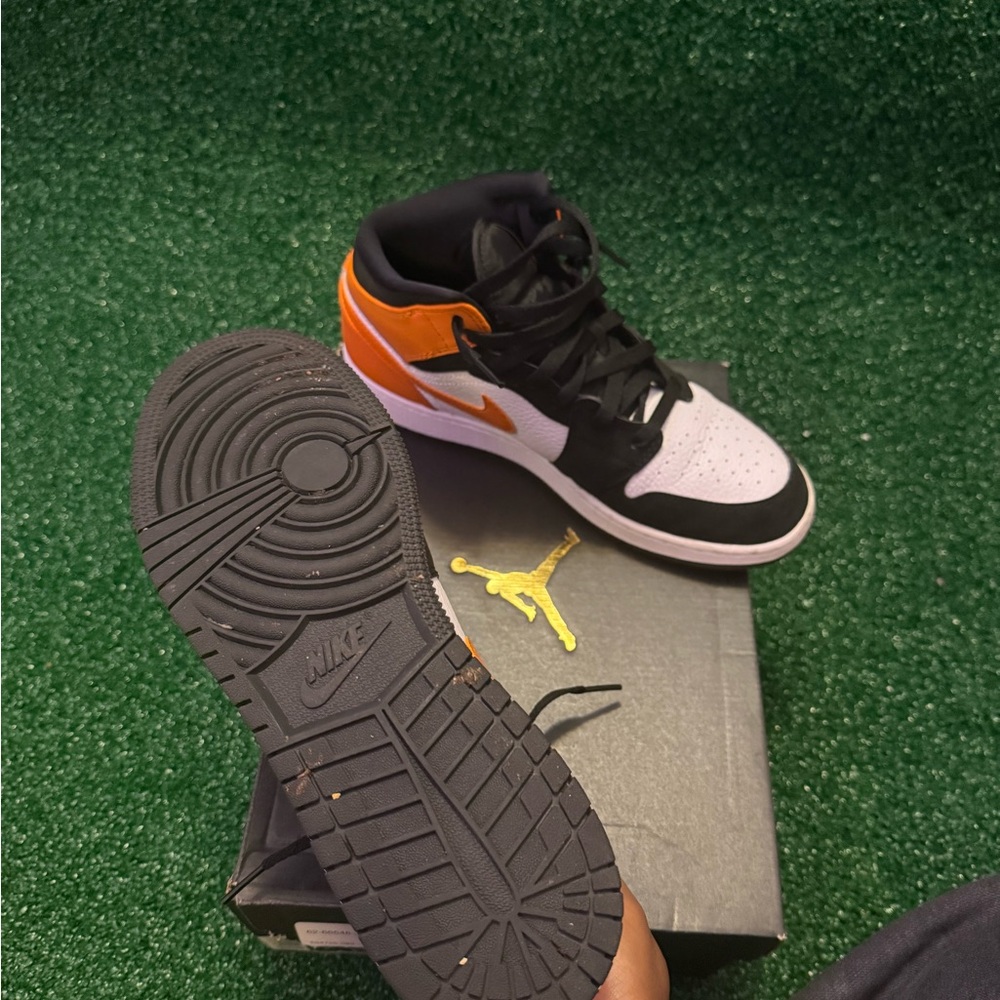 Black and Orange Air Jordan 1 Mid